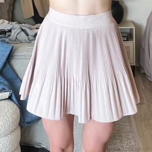 Storers Skater Skirt in blush pink/ neutral tan (back on)